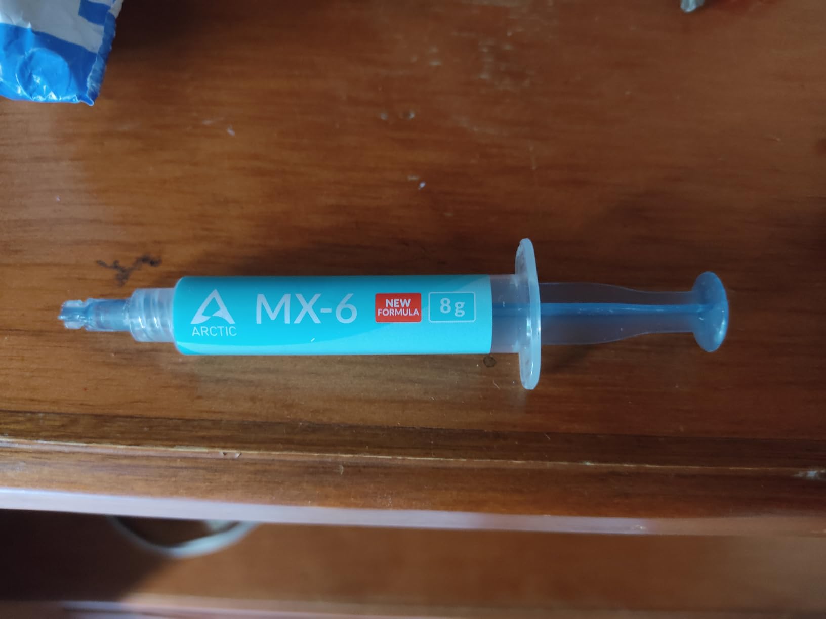 ARCTIC MX-6 (8 g) - Ultimate Performance Thermal Paste for CPU, Consoles, Graphics Cards, laptops, Very high Thermal Conductivity, Long Durability, Non-Conductive - Customer Photo 1