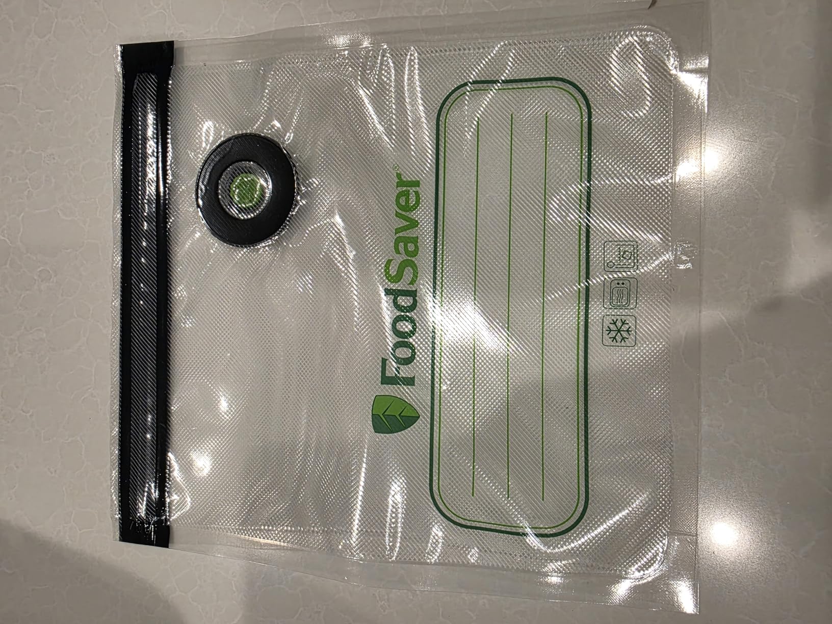 FoodSaver Mini Handheld Vacuum Sealer, Cordless, Vacuum Sealer with Charging Dock, Blue - Customer Photo 3