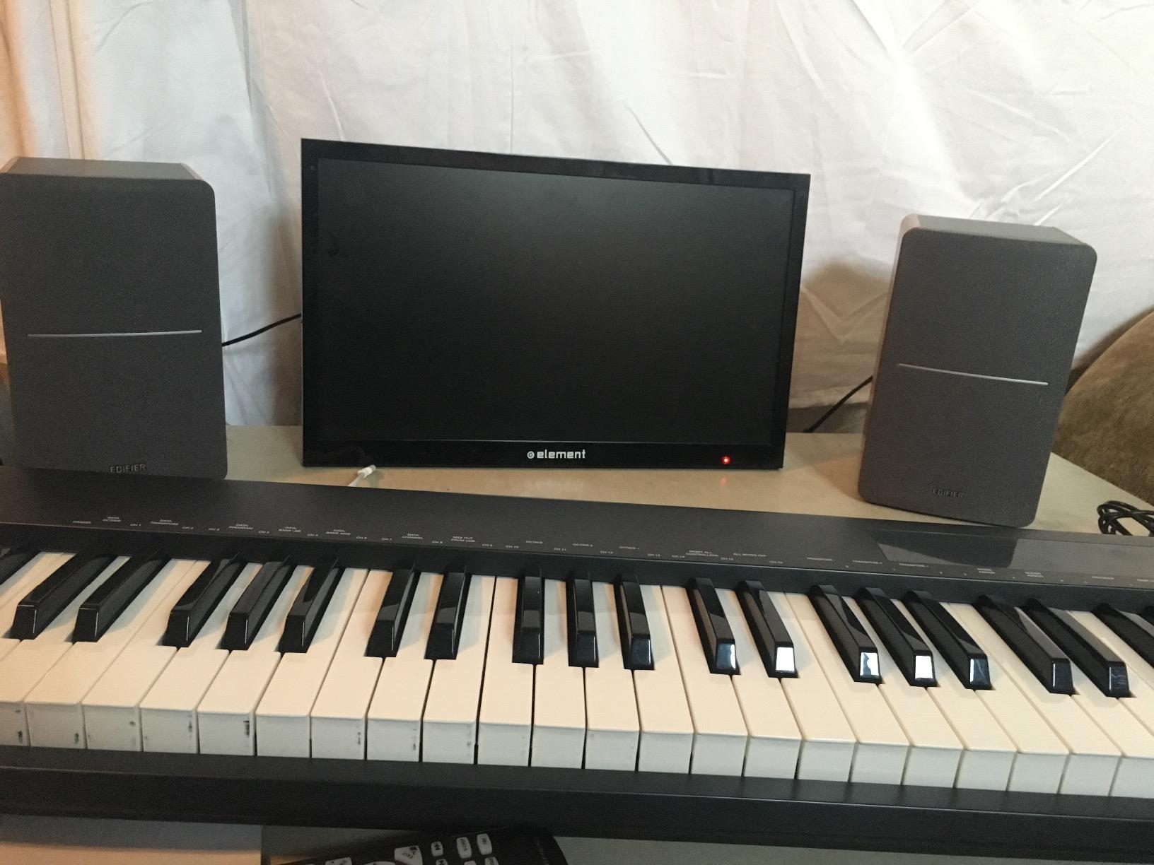 Edifier R1280T Powered Bookshelf Speakers - 2.0 Active Near Field Studio Monitor Speaker - Wooden Enclosure - 42 Watts RMS Power - Customer Photo 1