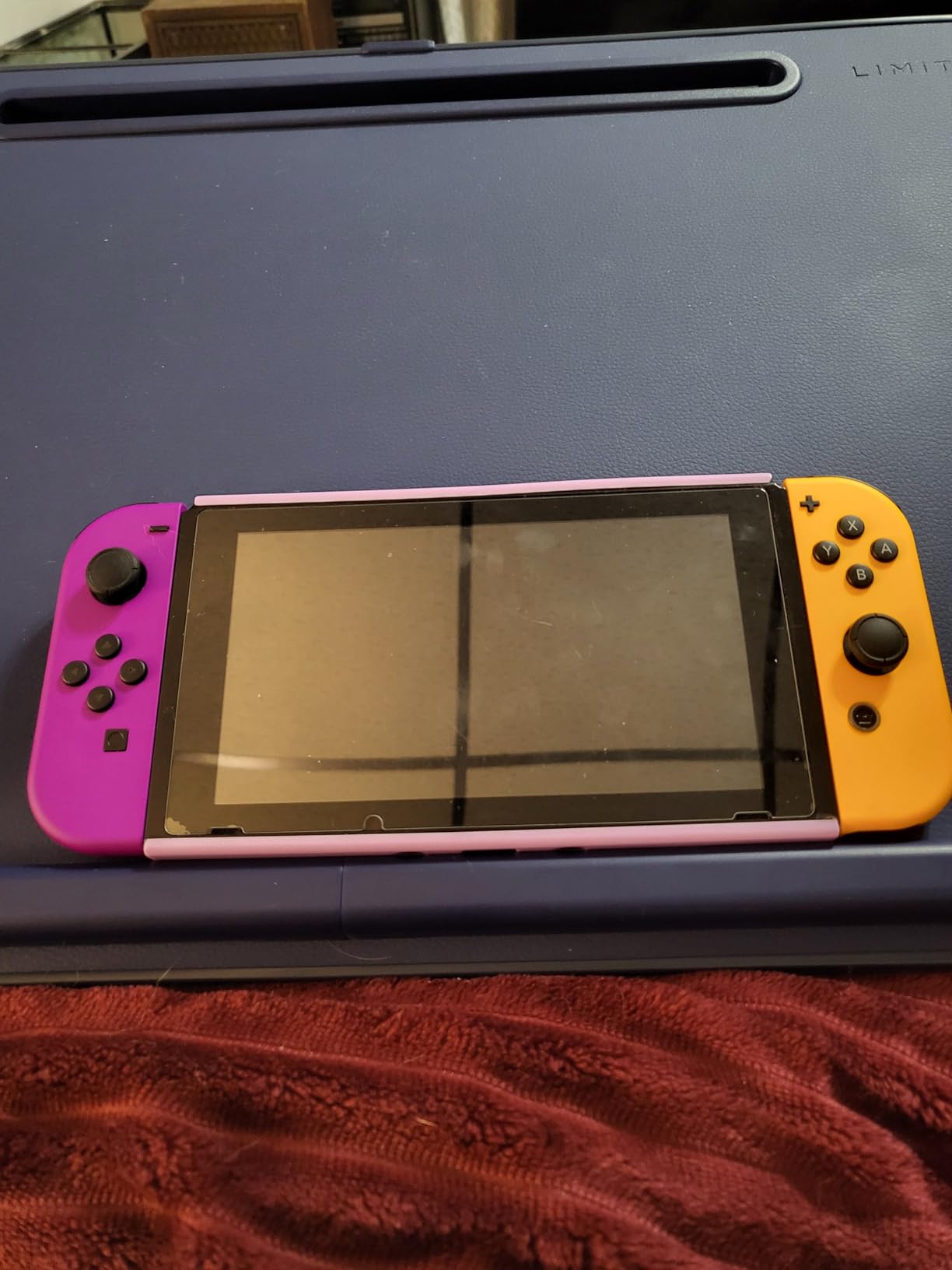 Nintendo Neon Purple/Neon Orange Joy-Con (L-R) - Switch Customer Review Nintendo Neon Purple/Neon Orange Joy-Con (L-R) - Switch - Customer Photo 2