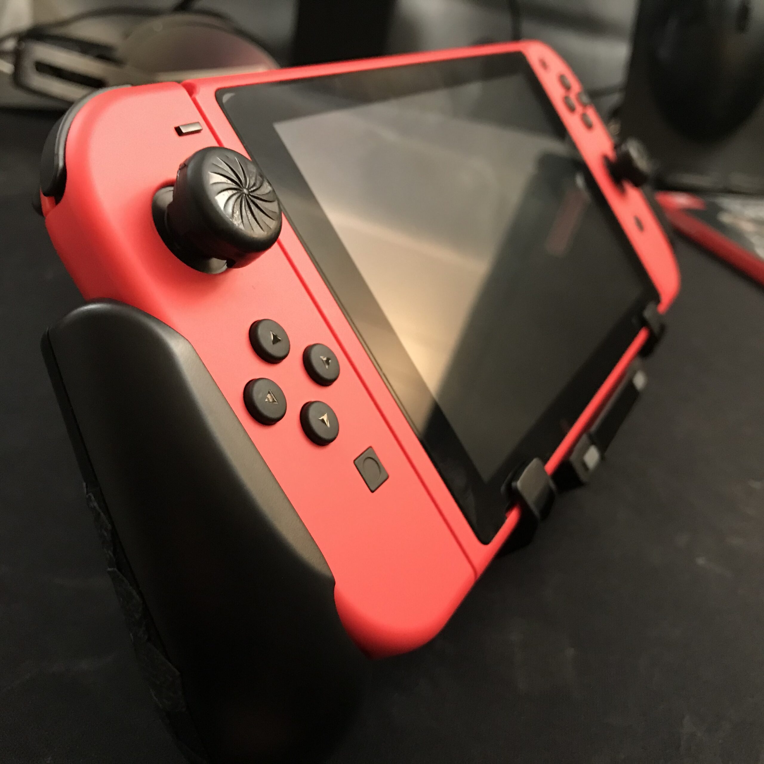Switch Grip with Upgraded Adjustable Stand, Compatible with Nintendo Switch & OLED, OIVO Asymmetrical Grip with Adjustable Stand and 5 Game Slots-4 Thumb Caps Included - Customer Photo 2