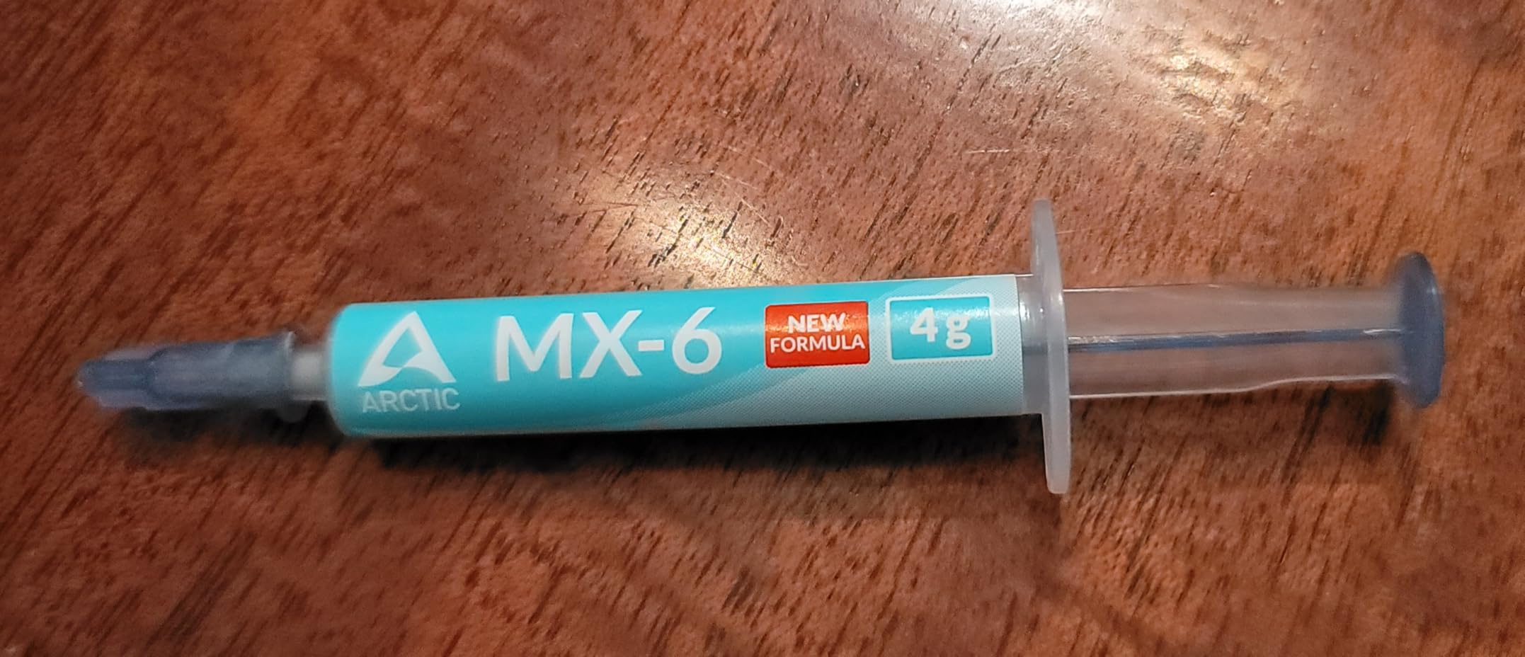 ARCTIC MX-6 (4 g) - Ultimate Performance Thermal Paste for CPU, Consoles, Graphics Cards, laptops, Very high Thermal Conductivity, Long Durability, Non-Conductive - Customer Photo 1