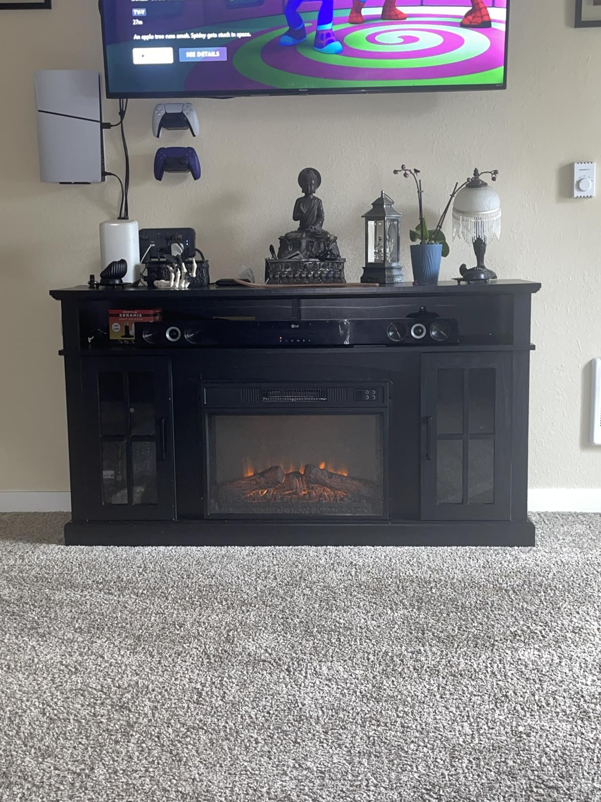 COSTWAY Electric Fireplace TV Stand for TVs Up to 65 Inches, 1400W Heater Insert with Remote Control, 6H Timer, 3-Level Flame, Overheat Protection and CSA Certification, Adjustable Shelves, Black - Customer Photo 1