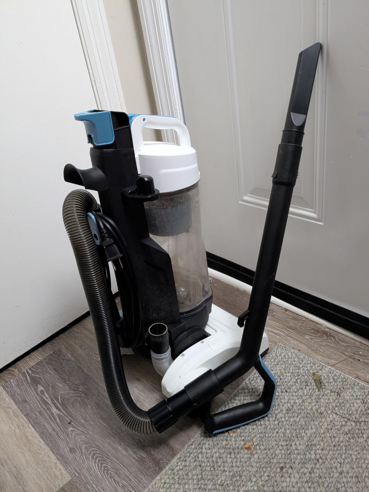 Amazon Basics Upright Bagless Vacuum Cleaner for Carpet and Hard Floors, With Crevice and Upholstery Tools, Detachable Handle, Lightweight (8.4 lbs), 1.7L Dust Cup, 720W, 25ft Cord, Black/White Customer Review Amazon Basics Upright Bagless Vacuum Cleaner for Carpet and Hard Floors, With Crevice and Upholstery Tools, Detachable Handle, Lightweight (8.4 lbs), 1.7L Dust Cup, 720W, 25ft Cord, Black/White - Customer Photo 2