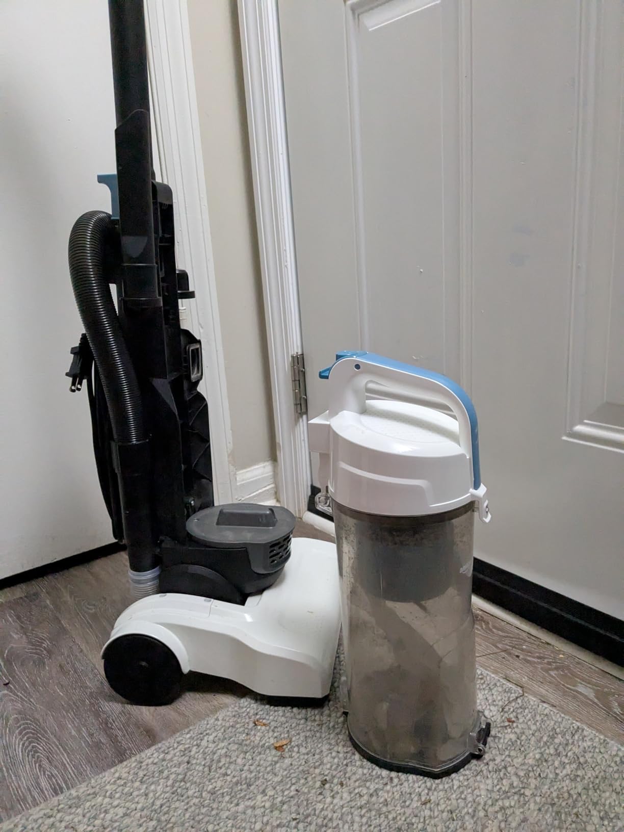 Amazon Basics Upright Bagless Vacuum Cleaner for Carpet and Hard Floors, With Crevice and Upholstery Tools, Detachable Handle, Lightweight (8.4 lbs), 1.7L Dust Cup, 720W, 25ft Cord, Black/White Customer Review Amazon Basics Upright Bagless Vacuum Cleaner for Carpet and Hard Floors, With Crevice and Upholstery Tools, Detachable Handle, Lightweight (8.4 lbs), 1.7L Dust Cup, 720W, 25ft Cord, Black/White - Customer Photo 5