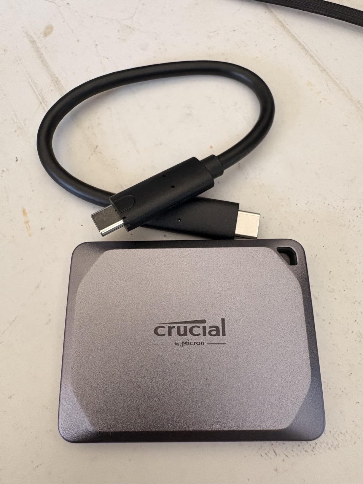 Crucial X9 Pro for Mac 2TB Portable SSD, Up to 1050MB/s Read/Write, 3.2 USB-C, External Solid State Drive, Optimized for Apple Devices, for Professional Creators, Light Gold - CT2000X9PROMACSSD9B02 - Customer Photo 1