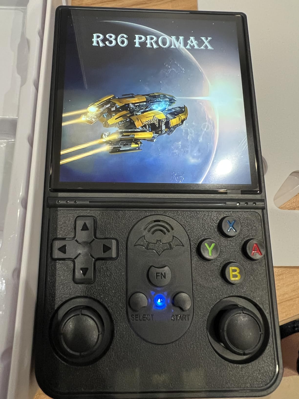 R36 PROMAX Retro Handheld Game Console,4.0 Inch Full-Lamination IPS Screen Retro Gaming Console,Linux System,Built-in 64GB Memory Retro Game Console,Portable Arcade Video Gaming Console - Customer Photo 1