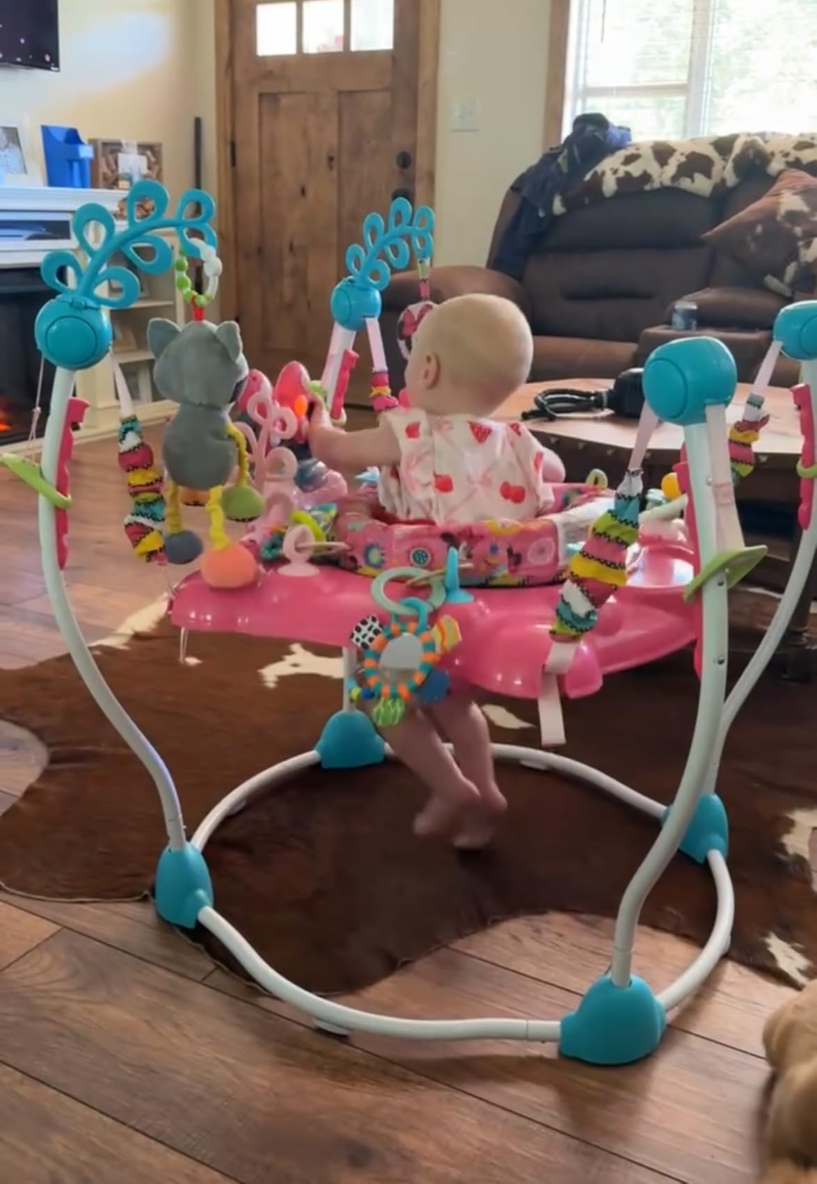 Bright Starts Disney Baby MINNIE MOUSE PeekABoo Baby Activity Center Jumper with 8 Toys, Lights & Sounds, 360-Degree Seat, 6-12 Months (Pink/Blue) - Customer Photo 3