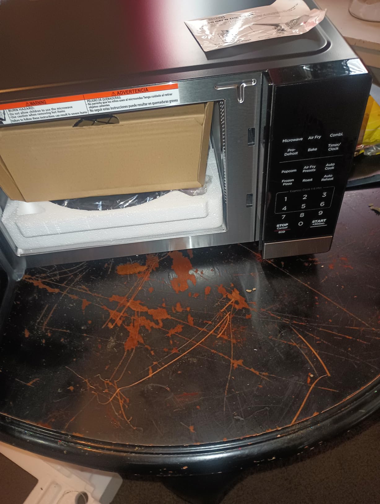 BLACK+DECKER EM031MB11 Digital Microwave Oven with Turntable Push-Button Door, Child Safety Lock, 1000W, 1.1cu.ft, Black & Stainless Steel, 1.1 Cu.ft - Customer Photo 2