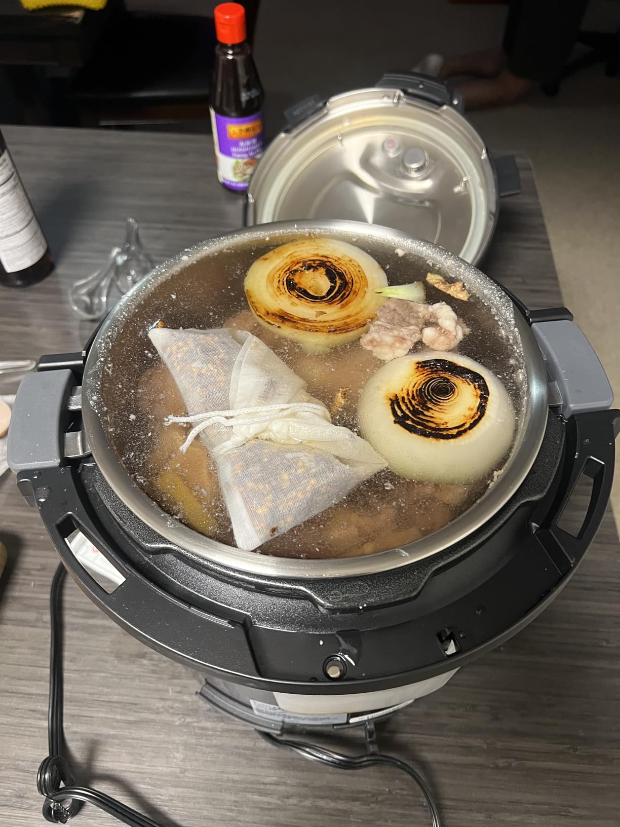 Instant Pot Pro 10-in-1 Pressure Cooker, Slow Cooker, Rice/Grain Cooker, Steamer, Sauté, Sous Vide, Yogurt Maker, Sterilizer, and Warmer, Includes App With Over 800 Recipes, Black, 6 Quart - Customer Photo 1