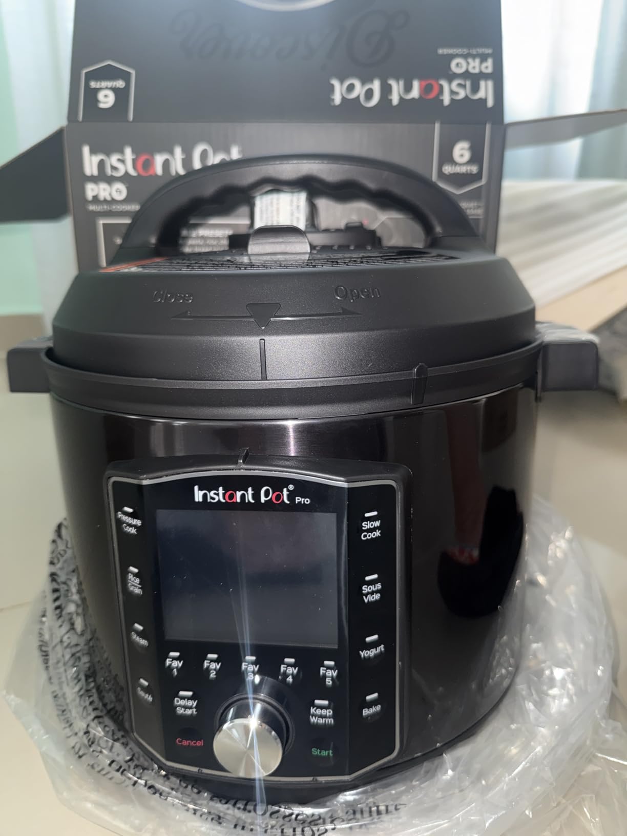 Instant Pot Pro 10-in-1 Pressure Cooker, Slow Cooker, Rice/Grain Cooker, Steamer, Sauté, Sous Vide, Yogurt Maker, Sterilizer, and Warmer, Includes App With Over 800 Recipes, Black, 6 Quart - Customer Photo 3