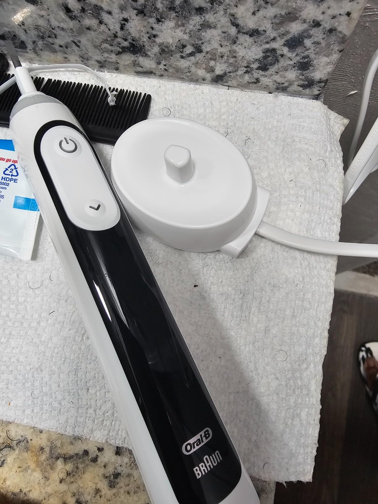 Philips Sonicare 4100 Rechargeable Electric Toothbrush, with Pressure Sensor, 2 Intensity Settings, SmarTimer and QuadPacer, 14-Day Battery Life, Black, Model HX3681/24 - Customer Photo 1