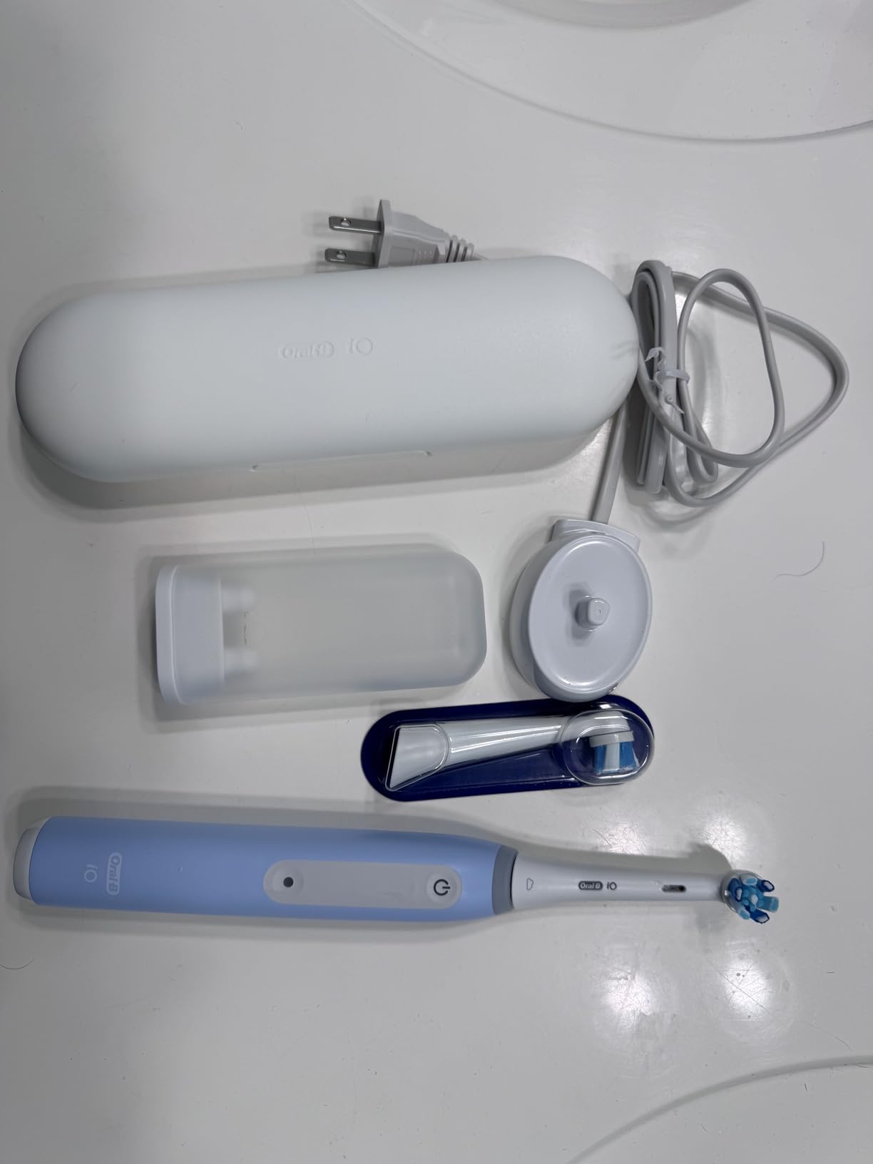 Oral-B iO Deep Clean Rechargeable Electric Powered Toothbrush, Black with iO Series 3 Limited, 2 Brush Heads and Travel Case - Pressure Sensor to Protect Gums - 3 Cleaning Settings - 2 Minute Timer Customer Review Oral-B iO Deep Clean Rechargeable Electric Powered Toothbrush, Black with iO Series 3 Limited, 2 Brush Heads and Travel Case - Pressure Sensor to Protect Gums - 3 Cleaning Settings - 2 Minute Timer - Customer Photo 2