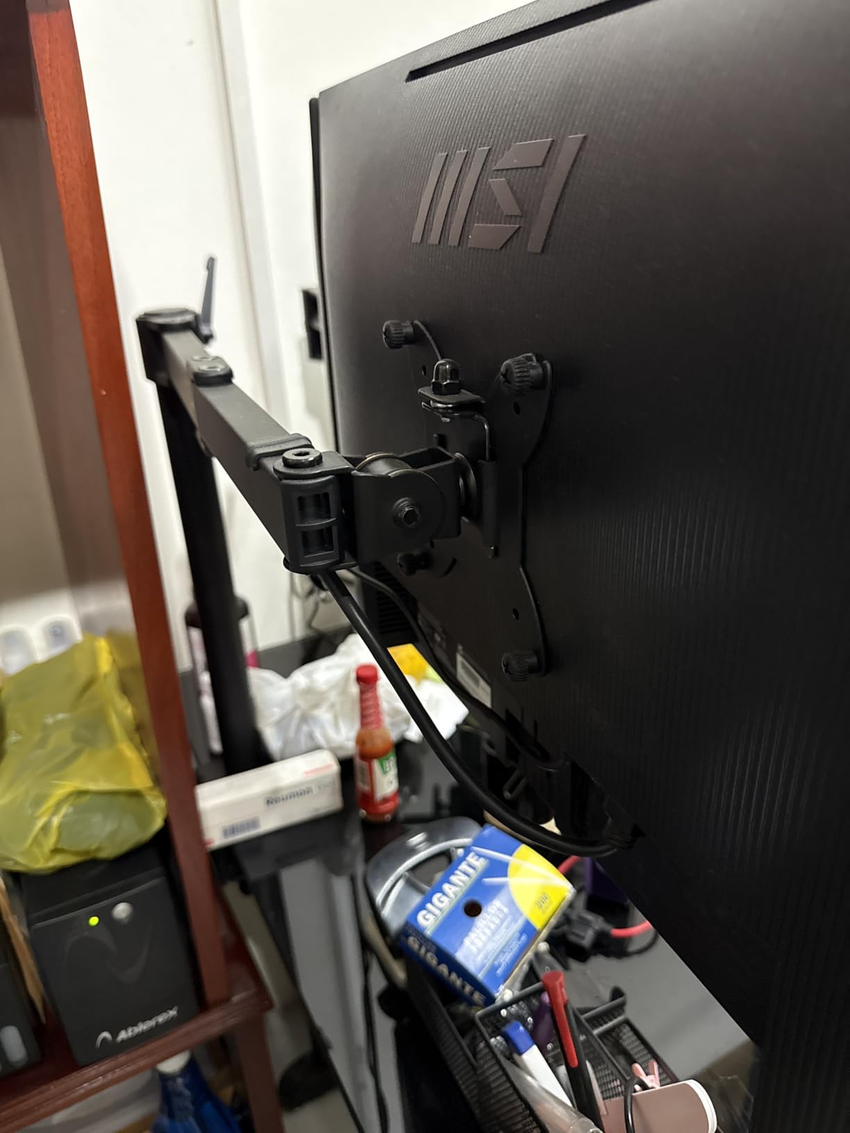 Amazon Basics Gas Spring Single Computer Monitor Arm Mount, Adjustable, Holds up to 27