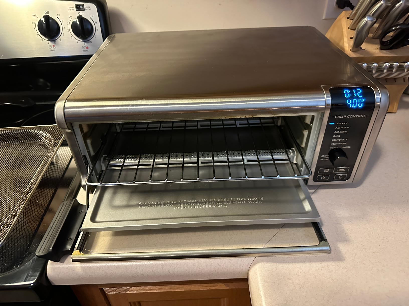 Ninja Flip Toaster Oven&Air Fryer, 8-in-1 Functionality, Flip Up&Away Capability for Storage Space, LargeCapacity, Air Fry Basket, SheetPan, Wire Rack&Removable Crumb Tray, Stainless,1800 watts, SP151 - Customer Photo 2