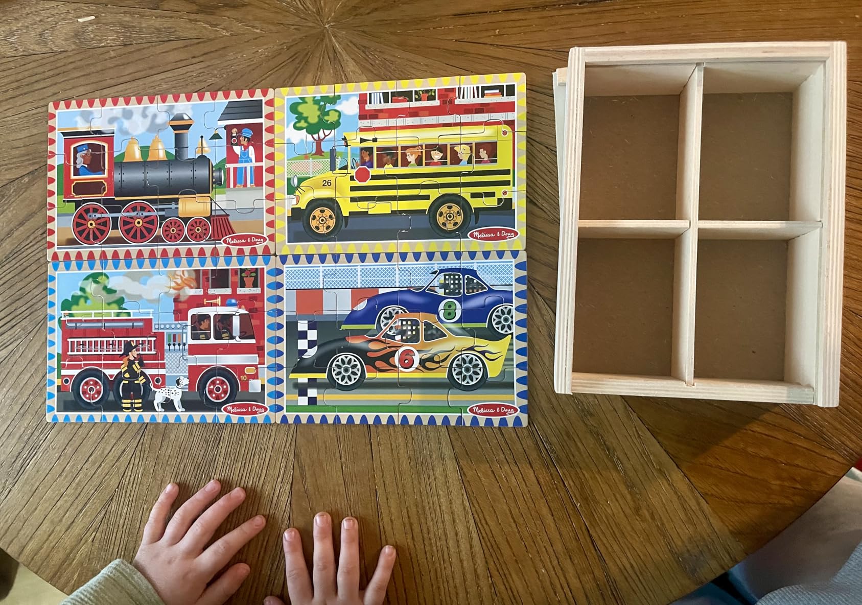 Melissa & Doug 4-in-1 Wooden Vehicle Jigsaw Puzzle Set, 48 Pieces with Storage Box, Toddler Puzzle Toy for Kids Ages 3+ - FSC Certified - Customer Photo 1