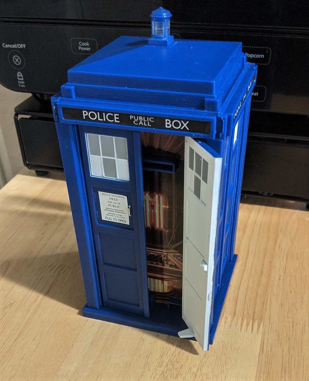 Doctor Who Electronic Tardis Talking Money Bank - Features Speech & Sound Effects, Flashing Lantern Light & Opening Front Doors - Deposit Coin Inside Police Box - Bigger On The Inside! Customer Review Doctor Who Electronic Tardis Talking Money Bank - Features Speech & Sound Effects, Flashing Lantern Light & Opening Front Doors - Deposit Coin Inside Police Box - Bigger On The Inside! - Customer Photo 2