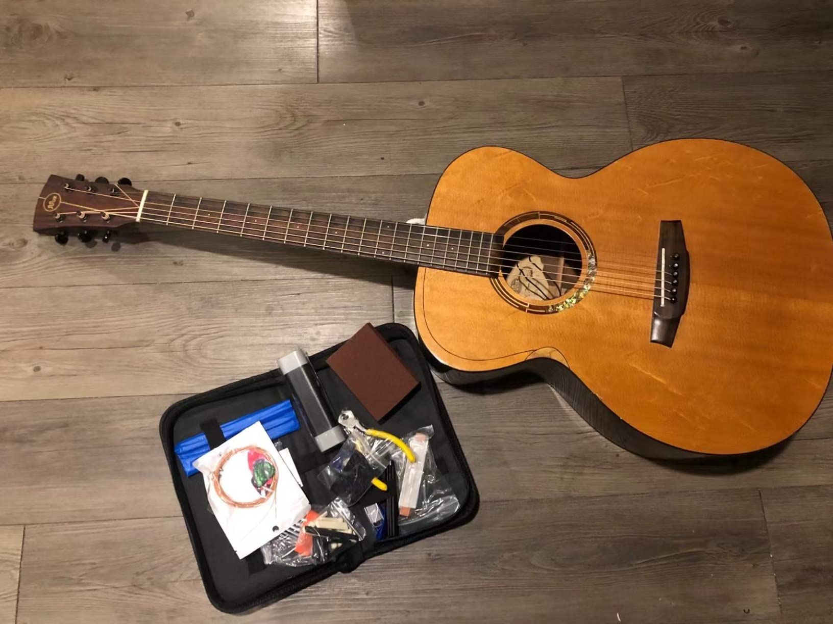 72PCS Guitar Tool Kit，Professional Guitar Repairing Maintenance Tool Kit with Guitar Strings Picks Bridge Pins Gauge Guitar Accessories Gift for Acoustic Guitar Electric Guitar Ukulele Bass Banjo - Customer Photo 1