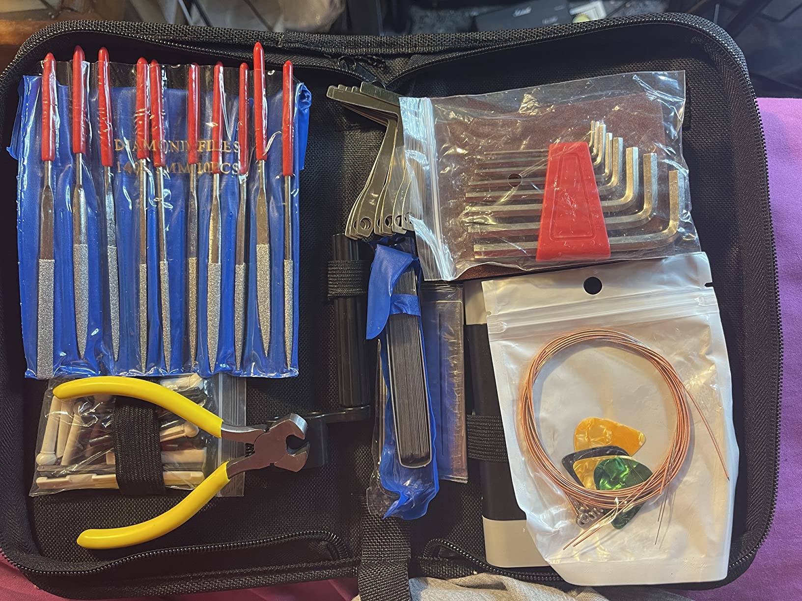 72PCS Guitar Tool Kit，Professional Guitar Repairing Maintenance Tool Kit with Guitar Strings Picks Bridge Pins Gauge Guitar Accessories Gift for Acoustic Guitar Electric Guitar Ukulele Bass Banjo - Customer Photo 2