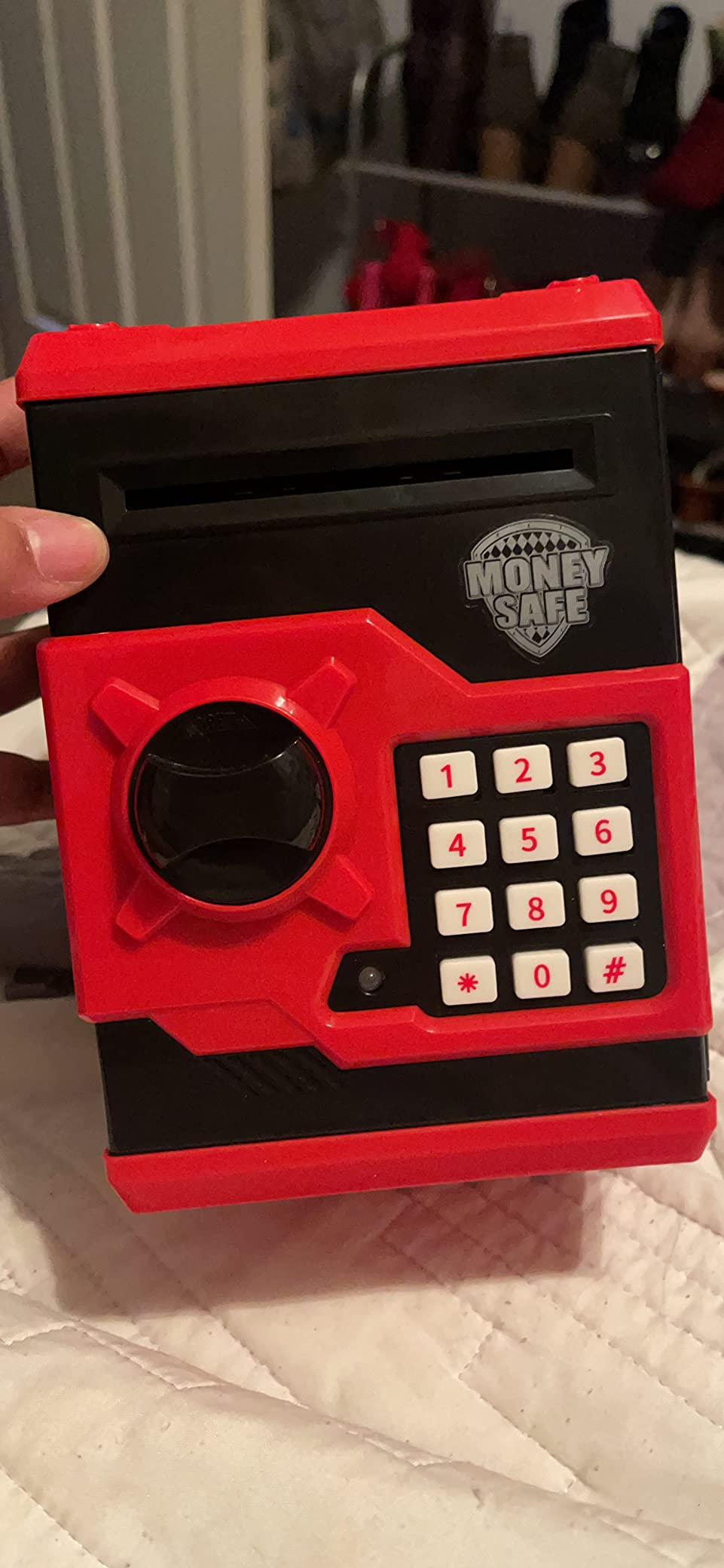 ATM Piggy Bank for Boys Girls, Vcertcpl Mini ATM Coin Bank Money Saving Box with Password, Kids Safe Money Jar for Adults with Auto Grab Bill Slot, Great Gift Toy Bank for Kids (Red+Black) Customer Review ATM Piggy Bank for Boys Girls, Vcertcpl Mini ATM Coin Bank Money Saving Box with Password, Kids Safe Money Jar for Adults with Auto Grab Bill Slot, Great Gift Toy Bank for Kids (Red+Black) - Customer Photo 2