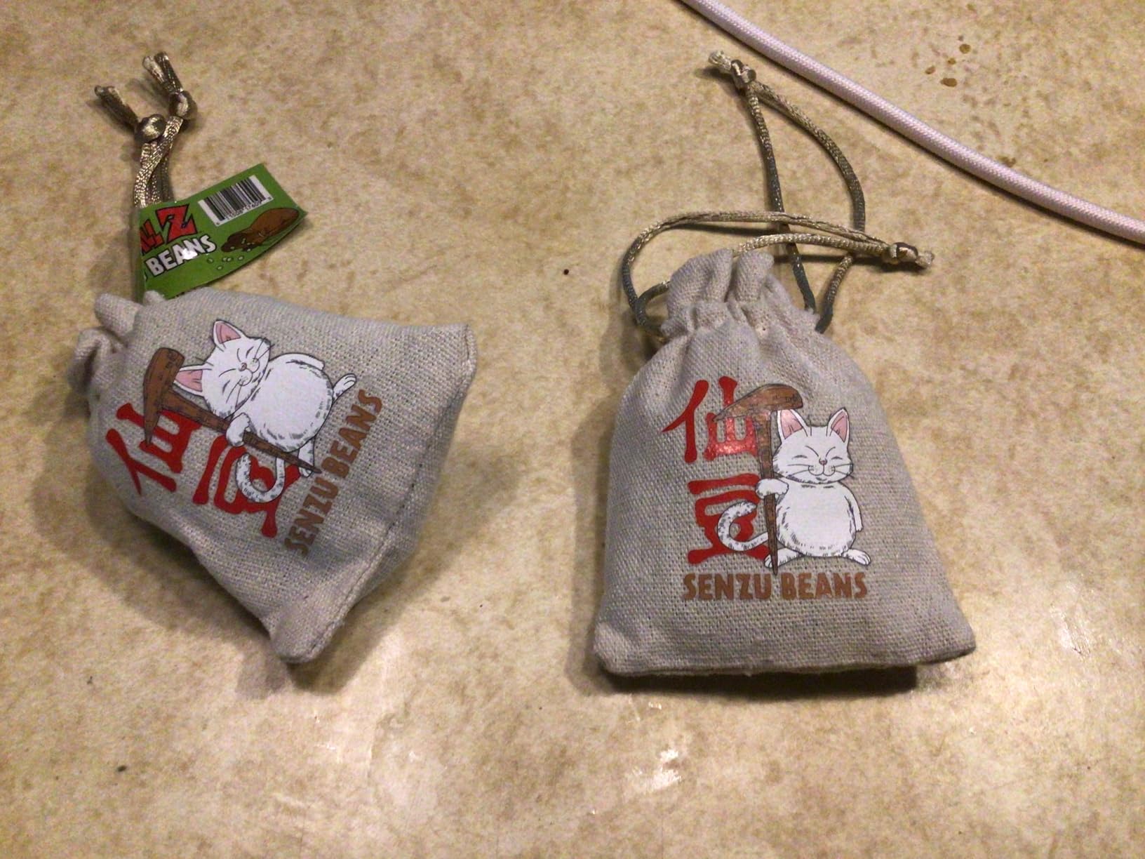 Boston America Dragonball Z Senzu Beans Candy 1 Collectible Korin Drawstring Bag Sour Green Apple Flavored Candy Green, Brown 2 Ounce (Pack of 1) - Customer Photo 2