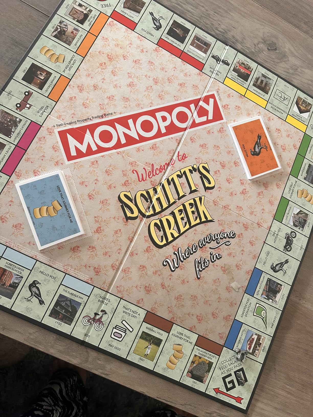 Monopoly Schitt's Creek | Game Tokens Include Bebe Crow, Patrick's Guitar, Rosebud Motel Key & More | Officially Licensed and Collectible Monopoly Game Based on Award Winning Series Schitt's Creek Customer Review Monopoly Schitt's Creek | Game Tokens Include Bebe Crow, Patrick's Guitar, Rosebud Motel Key & More | Officially Licensed and Collectible Monopoly Game Based on Award Winning Series Schitt's Creek - Customer Photo 1