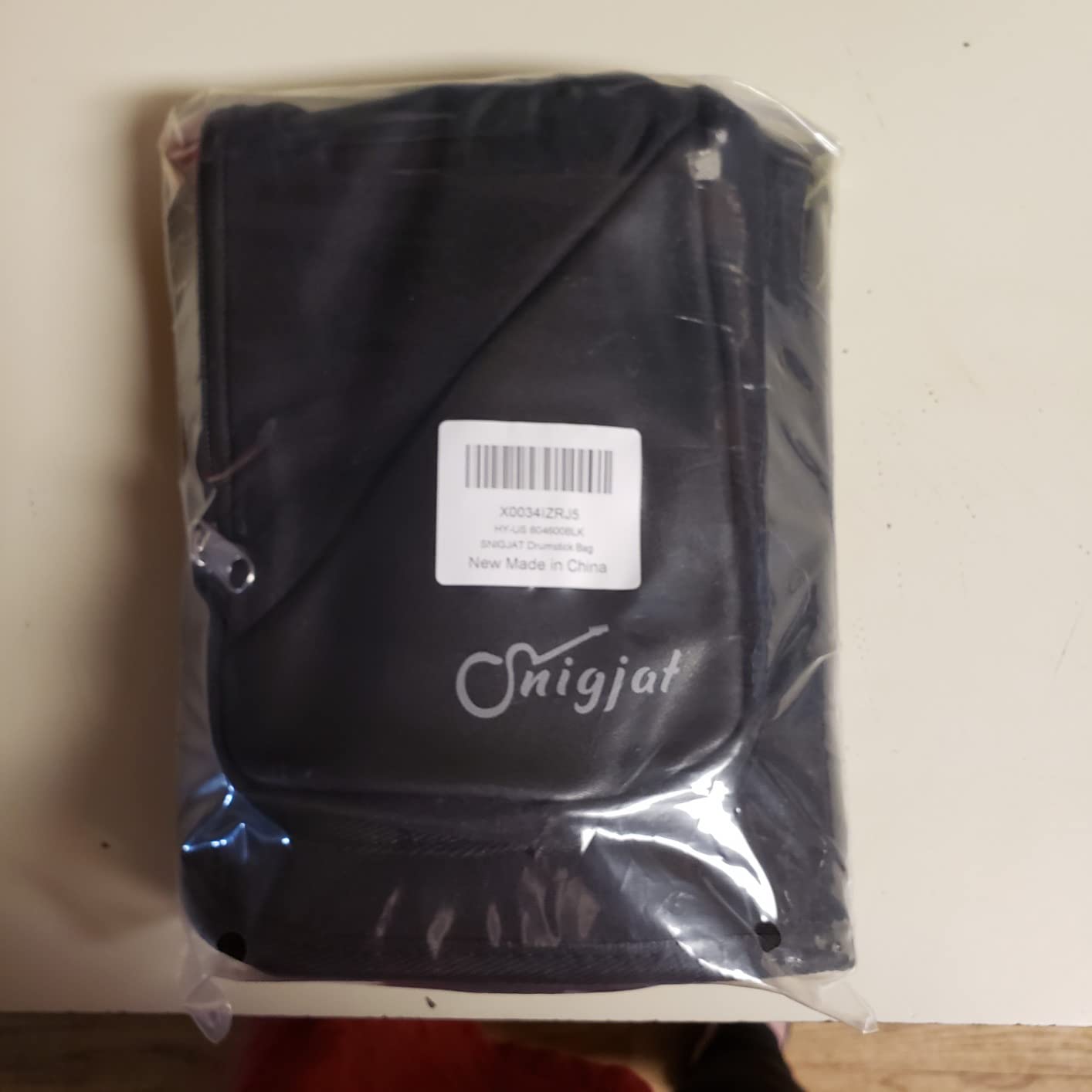 SNIGJAT Drumstick Bag with Crossbody Shoulder Strap, Drum Stick Bag with Large Capacity Anti-falling Pockets, Gifts for Drummers, Beginners in Band, Gig, Solid Drum Sticks Case w/Metal Hooks - Customer Photo 2