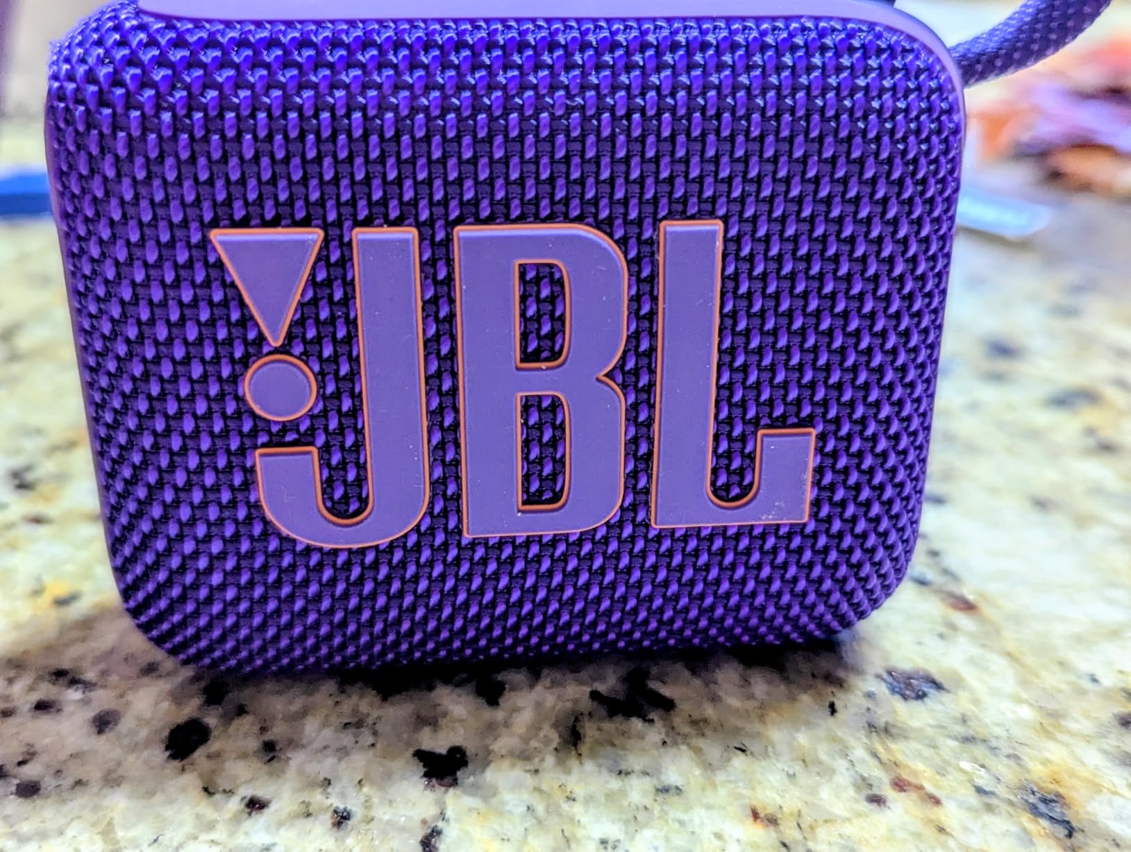 JBL Go 4 - Ultra-Portable, Waterproof and Dustproof Bluetooth Speaker, Big JBL Pro Sound with Punchy bass, 7-Hour Built-in Battery, Made in Part with Recycled Materials (Purple) - Customer Photo 2