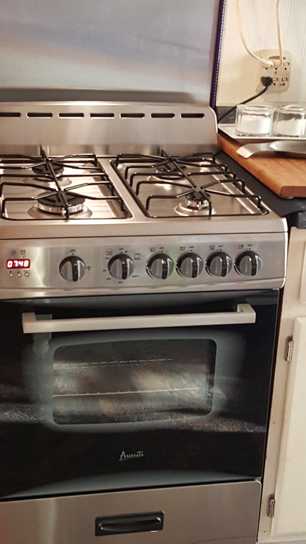 Avanti Gas Range Oven, Compact Freestanding Design, 4 Sealed Burners with Electronic Ignition, 2.6 Cu.Ft. Capacity Features Storage Drawer Broiler and Accessories, 24-Inch, Black - Customer Photo 1