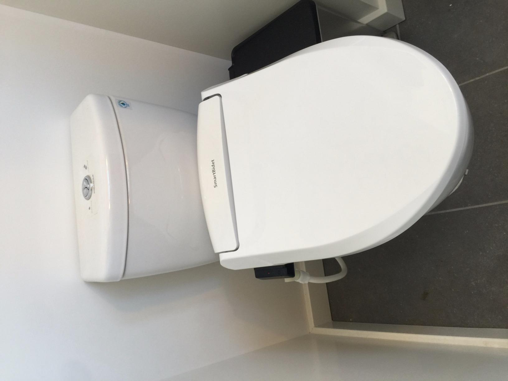 SmartBidet SB-1000WE Electric Smart Bidet Toilet Seat with Heated Seat, Warm Air Dryer, Temperature Control Wash, and Remote Control, Elongated Seat - Customer Photo 1