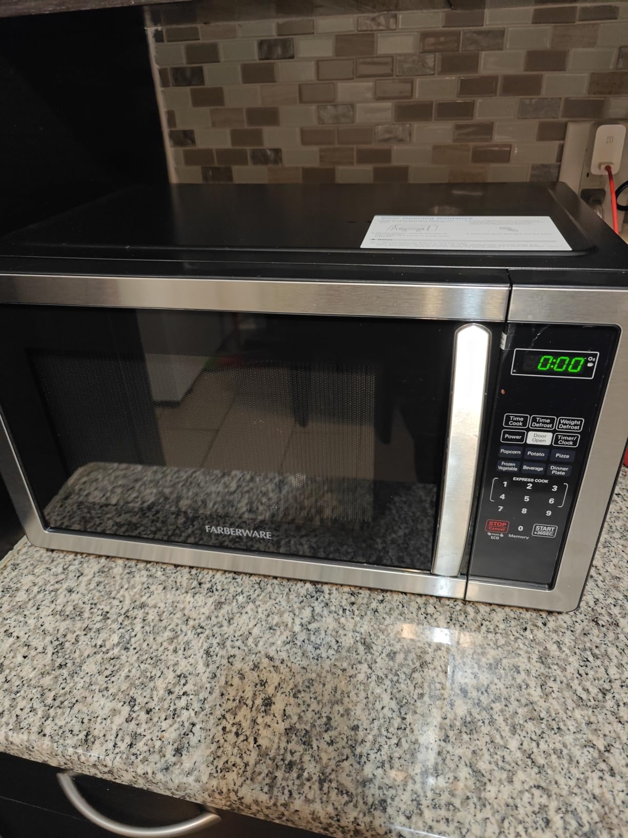 Farberware 1.1 Cu. Ft. Countertop Microwave Oven – 1000 Watts Power, Auto Cook Settings, Defrost, Easy Clean and Child Safety Lock - Stainless - Customer Photo 1