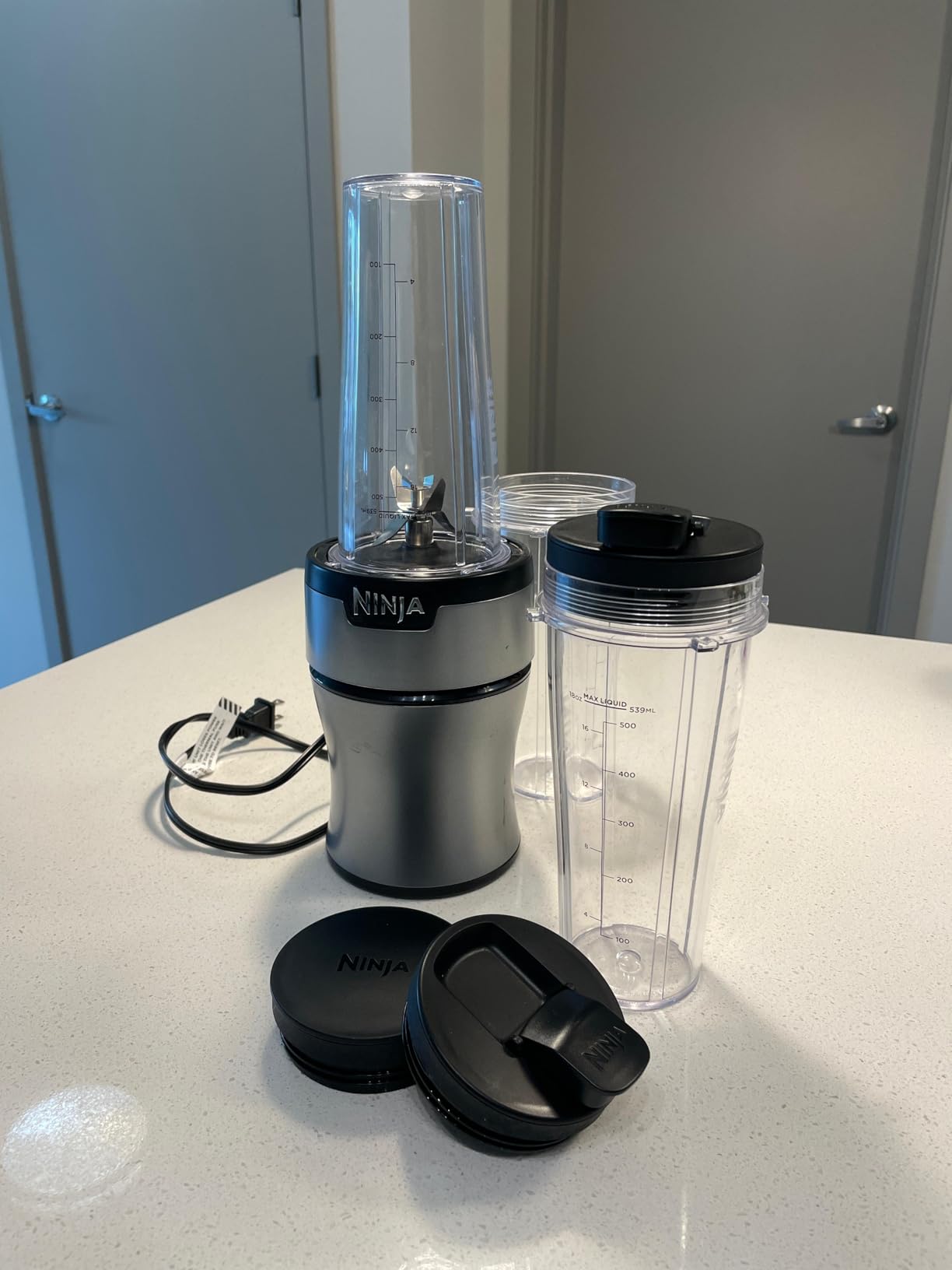 Ninja Fit Compact Personal Blender, Portable Blender for Smoothies, Shakes, Food Prep, and Frozen Blending, 700-Watt Base, (2) 16-oz. Cups and Spout Lids, Black QB3001SS - Customer Photo 1