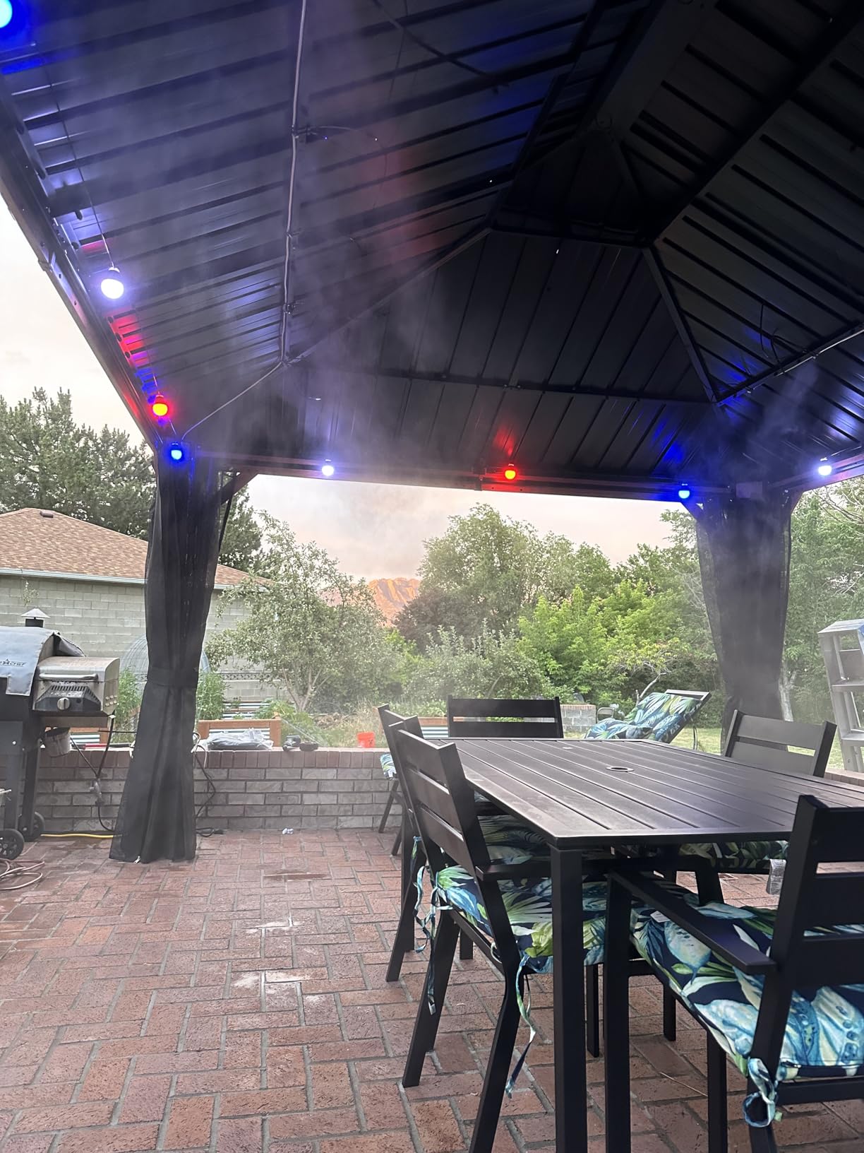 Residential Patio Misting System- Made in USA Pump- 200 psi Mid Pressure Patio Misting System-12 Nozzles Misting System. Cools by up to 30 Degrees. - Customer Photo 1