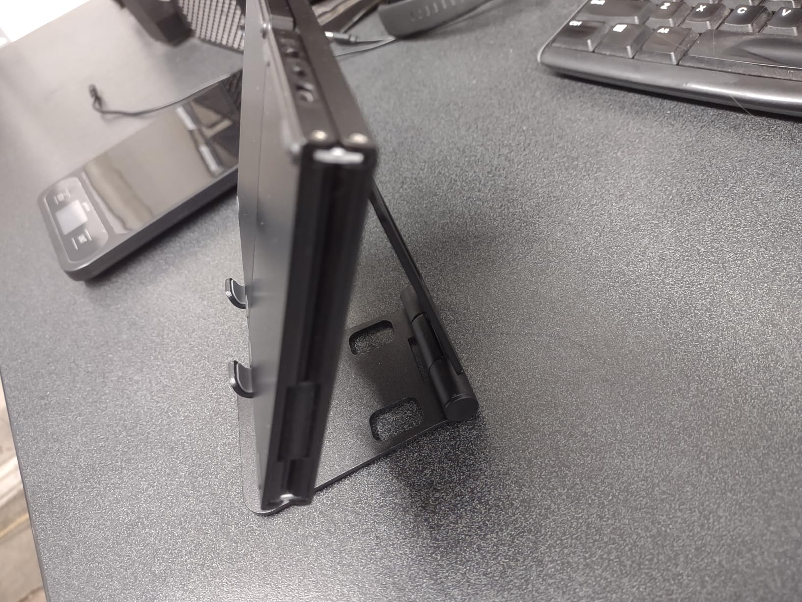 Nulaxy Dual Folding Cell Phone Stand, Fully Adjustable Foldable Desktop Phone Holder Cradle Dock Compatible with iPhone 17 16 15 14 13 12 11 Pro Max Xs Xr X 8, Nintendo Switch, All Phones - Customer Photo 2