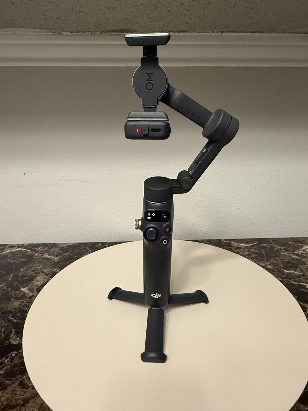DJI Osmo Mobile 7P Gimbal Stabilizer for iPhone, Android, Native Tracking, Lighting, 3-Axis Phone Gimbal, Quick Launch, One-Tap Edit, Built-in Extension Rod & Tripod, 10hrs Use, Phone Charging - Customer Photo 4