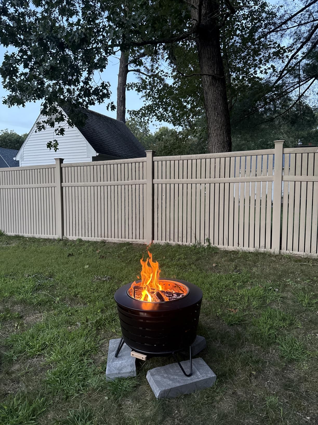 TIKI Patio Smokeless Outdoor Fire Pit, 25-Inch Wood-Burning Bonfire with Removable Ash Pan, Stand, and Weather-Resistant Cover customer photo 2