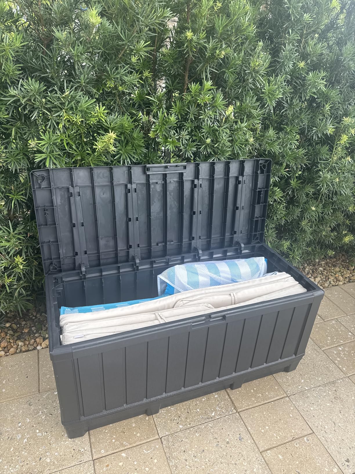 Keter Kentwood 92 Gallon Resin Deck Box-Organization and Storage for Patio Furniture Outdoor Cushions, Throw Pillows, Garden Tools and Pool Floats, Brown - Customer Photo 2