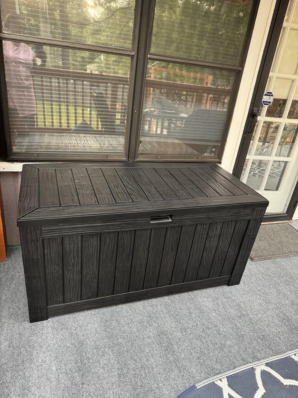 Flamaker Resin Deck Box 120 Gallon Waterproof Large Outdoor Indoor Storage Box Imitation Wood Resin for Patio Furniture Garden Tools and Pool (Black) - Customer Photo 1