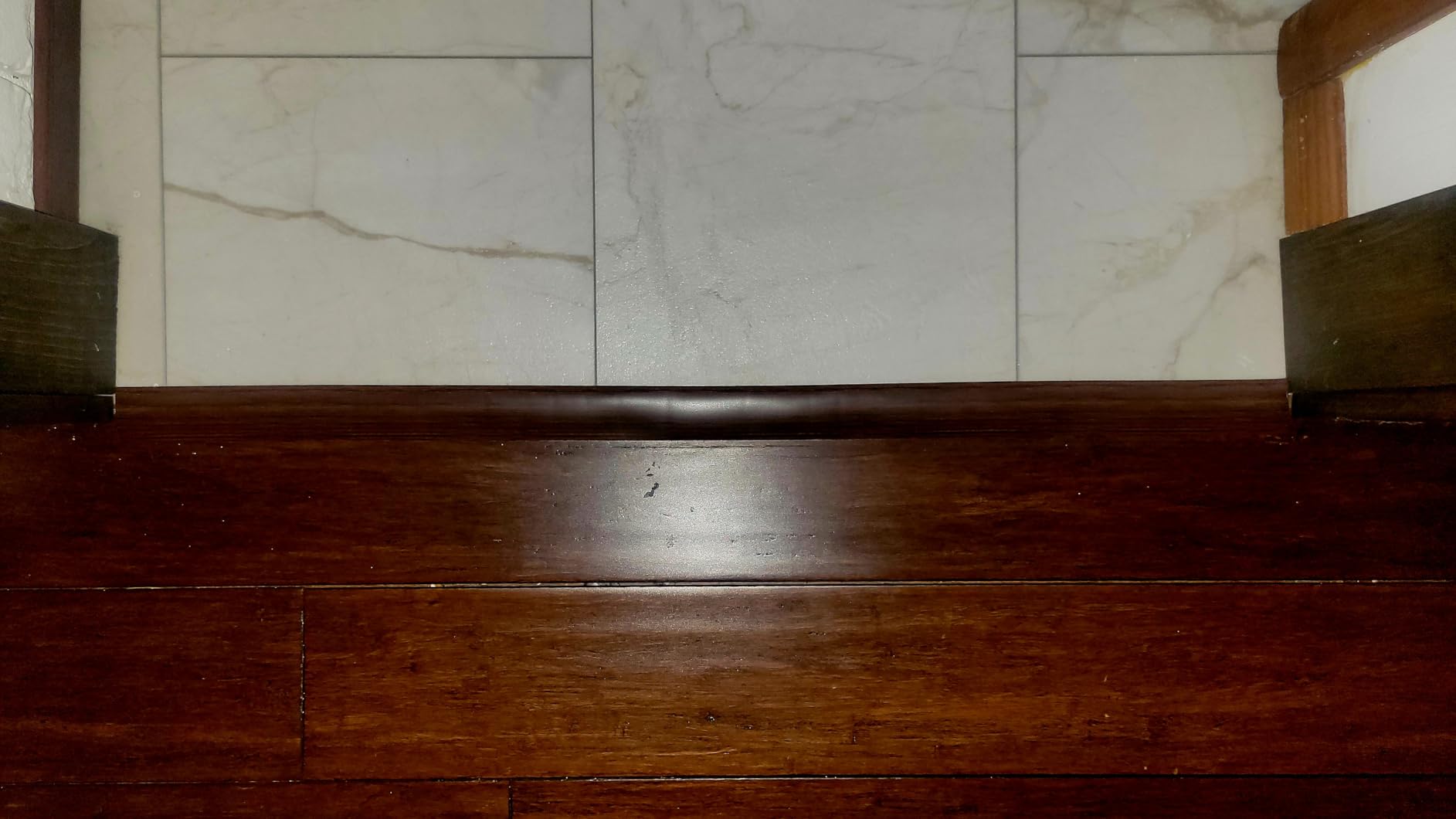 Art3d 4 FT Self Adhesive Vinyl Floor Transition Strip, Laminate Strip Flat Divider for Joining Gaps,Carpet Threshold Transition,Floor Tiles（1.57in, Brown） - Customer Photo 1