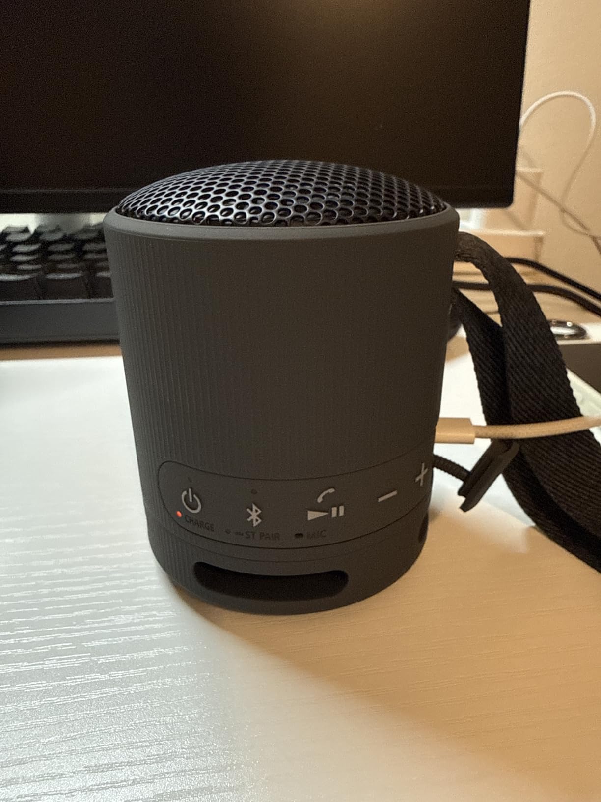 Sony SRS-XB100 Wireless Bluetooth Portable Lightweight Super-Compact Travel Speaker, Durable IP67 Waterproof & Dustproof Shower Speaker, 16 Hour Battery, Versatile Strap, & Hands-free Calling, Orange - Customer Photo 1