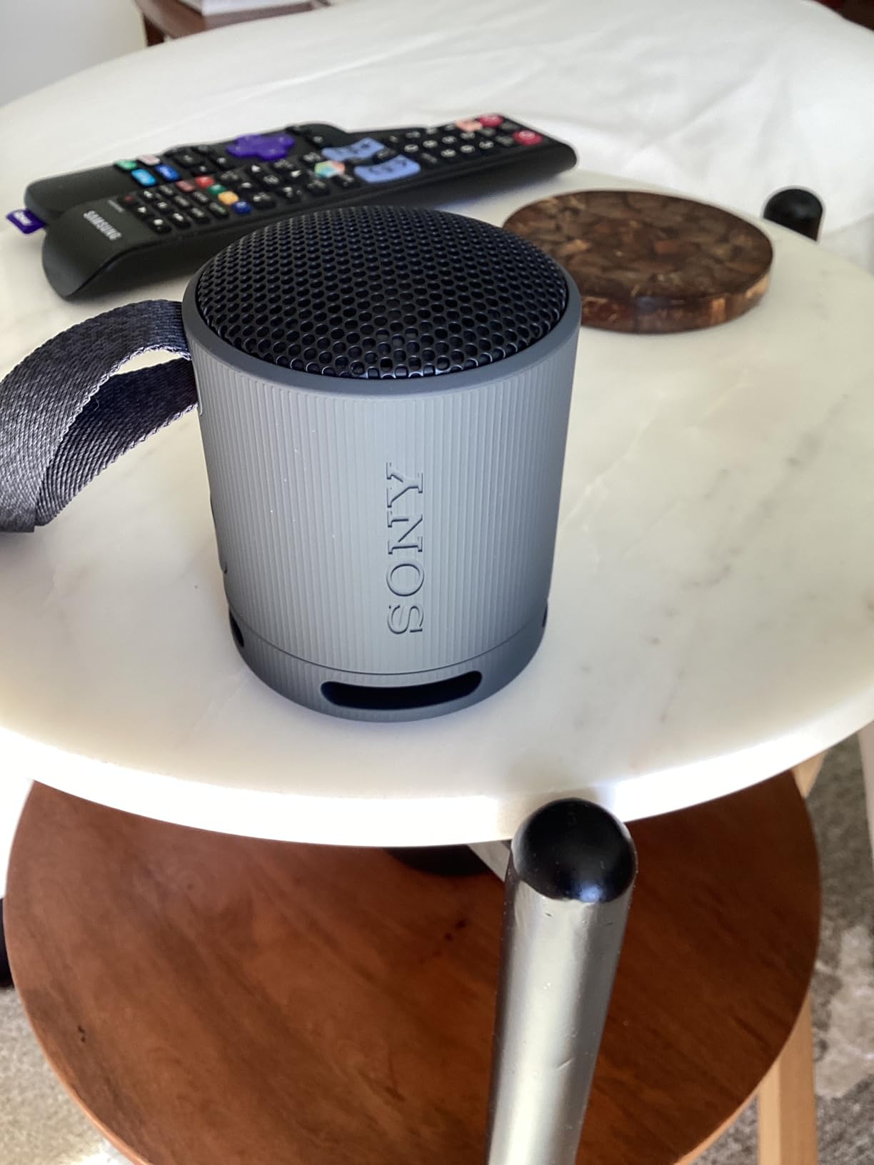 Sony SRS-XB100 Wireless Bluetooth Portable Lightweight Super-Compact Travel Speaker, Durable IP67 Waterproof & Dustproof Shower Speaker, 16 Hour Battery, Versatile Strap, & Hands-free Calling, Orange - Customer Photo 2