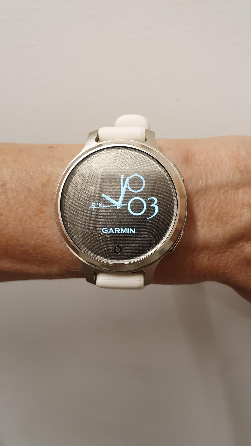 Garmin Lily 2 Active, Small and Stylish Smartwatch, Built-in GPS, Hidden Display, Patterned Lens, Up to 9 Days Battery Life, Lunar Gold with Bone Silicone Band - Customer Photo 1