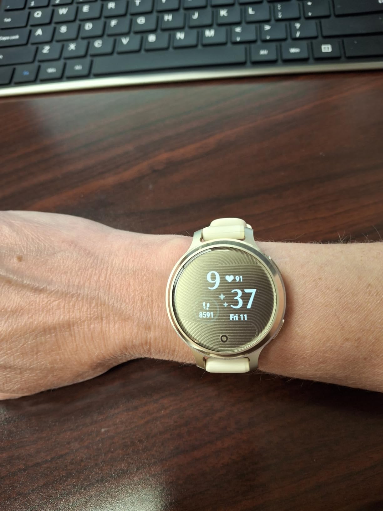 Garmin Lily 2 Active, Small and Stylish Smartwatch, Built-in GPS, Hidden Display, Patterned Lens, Up to 9 Days Battery Life, Lunar Gold with Bone Silicone Band - Customer Photo 3
