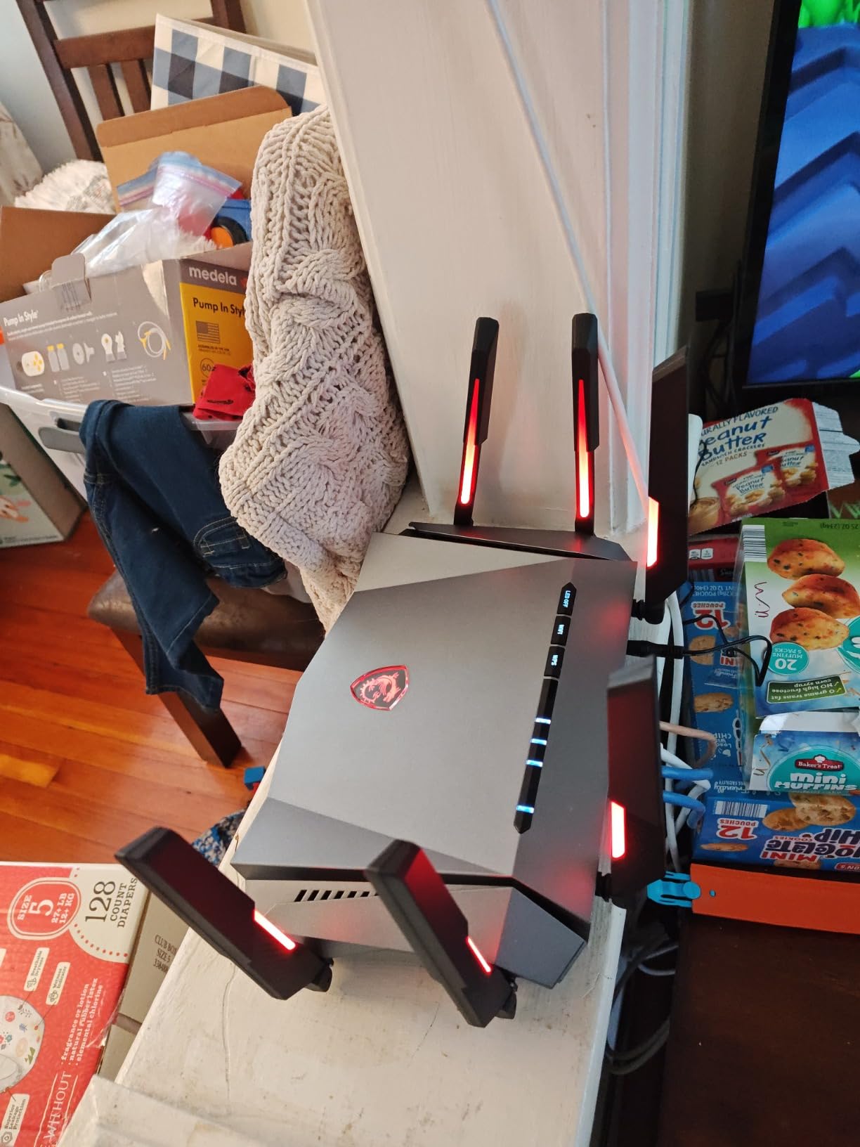 MSI Radix AXE6600 WiFi 6E Tri-Band Gaming Router, AI QoS, RGB, 1.8GHz Quad-Core Processor, MU-MIMO, Tri Band Gigabit Wireless, 8-Stream, High Speed Long Range Gaming Router customer photo 1