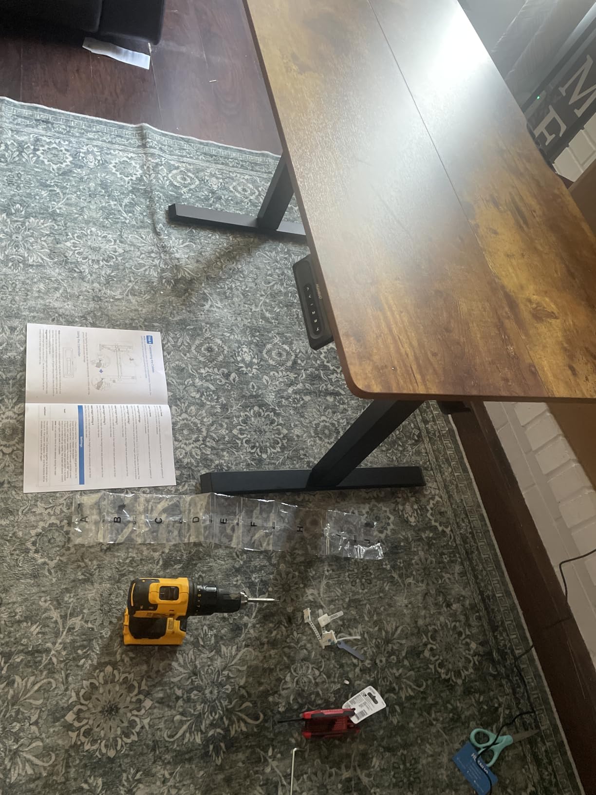 HUANUO Electric Standing Desk, 55 x 24 Inch Height Adjustable Computer Desk with Storage Bag, 4 Height Memory Settings, Sit Stand Up Desk for Home Office, Rustic Brown customer photo 1