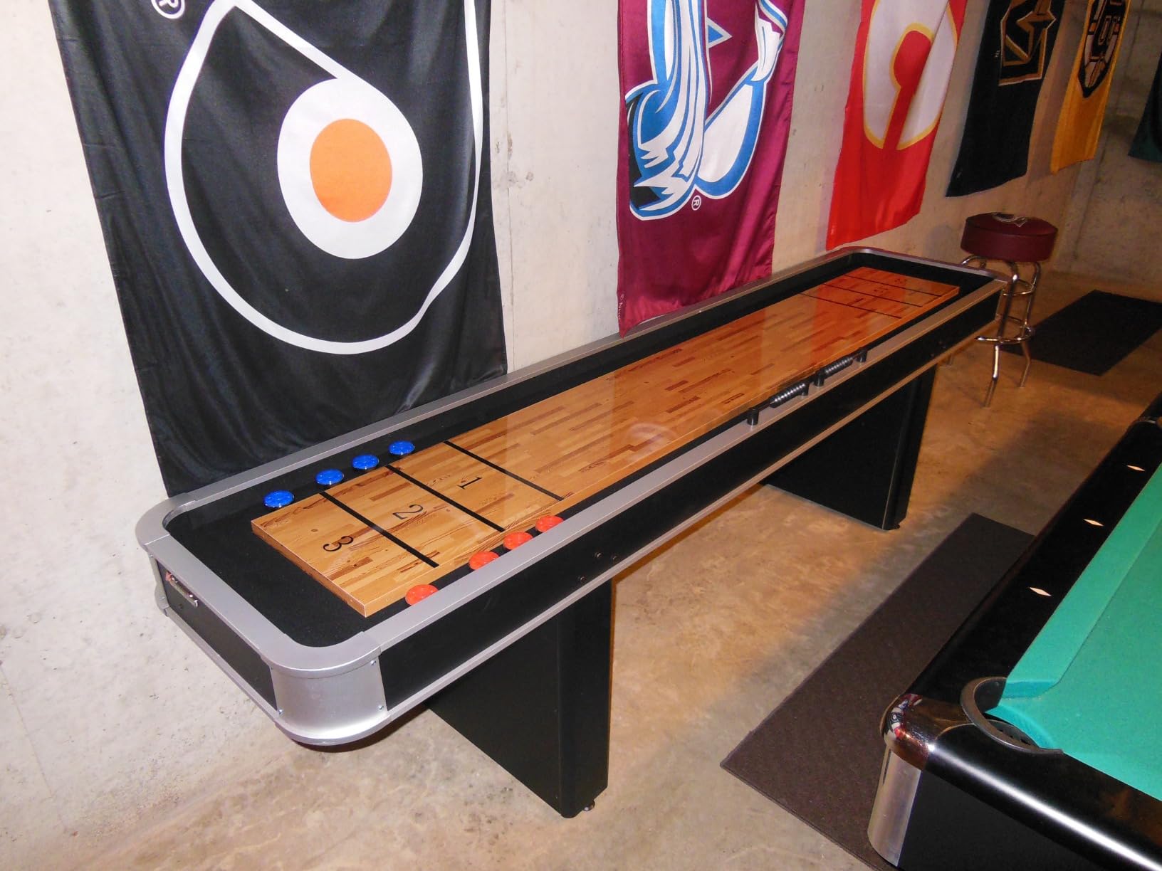 Atomic 9' LED Shuffleboard Tables with Poly-Coated Playing Surface for Smooth, Fast Puck Action and Pedestal Legs with Levelers for Optimum Stability and Level Play customer photo 2
