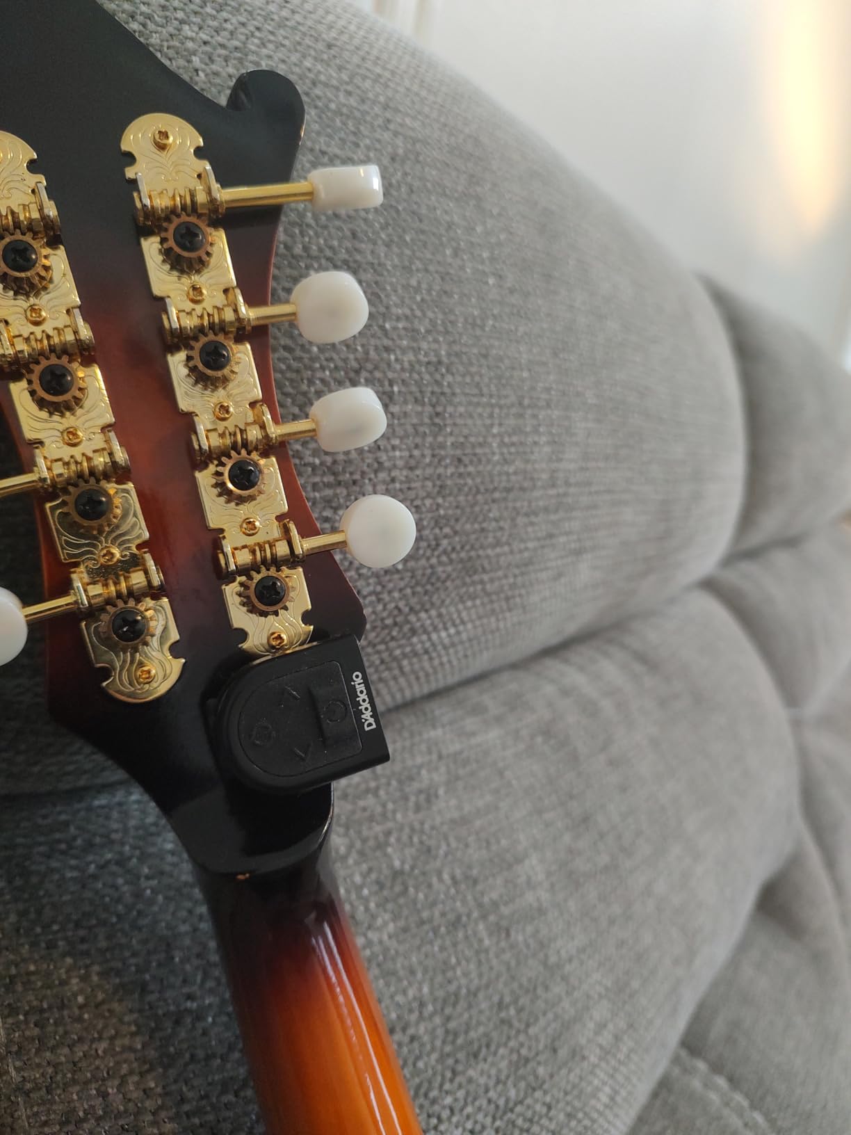 D'Addario Guitar Tuner - Micro Headstock Tuner - Tuner for Acoustic Guitar, Electric Guitar, Bass Guitar, Mandolin, Banjo, Ukulele - Compact & Discrete - Clip On - 1 Pack customer photo 1