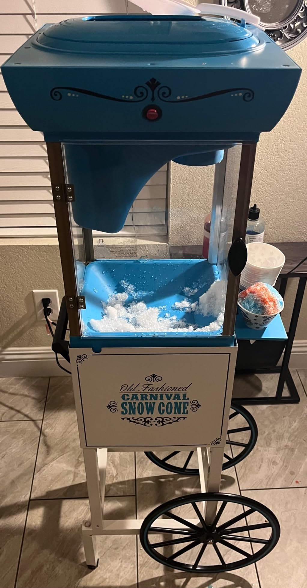 Nostalgia Snow Cone Shaved Ice Machine - Retro Cart Slushie Machine Makes 48 Icy Treats - Includes Metal Scoop, Storage Compartment, Wheels for Easy Mobility - White, Blue customer photo 2