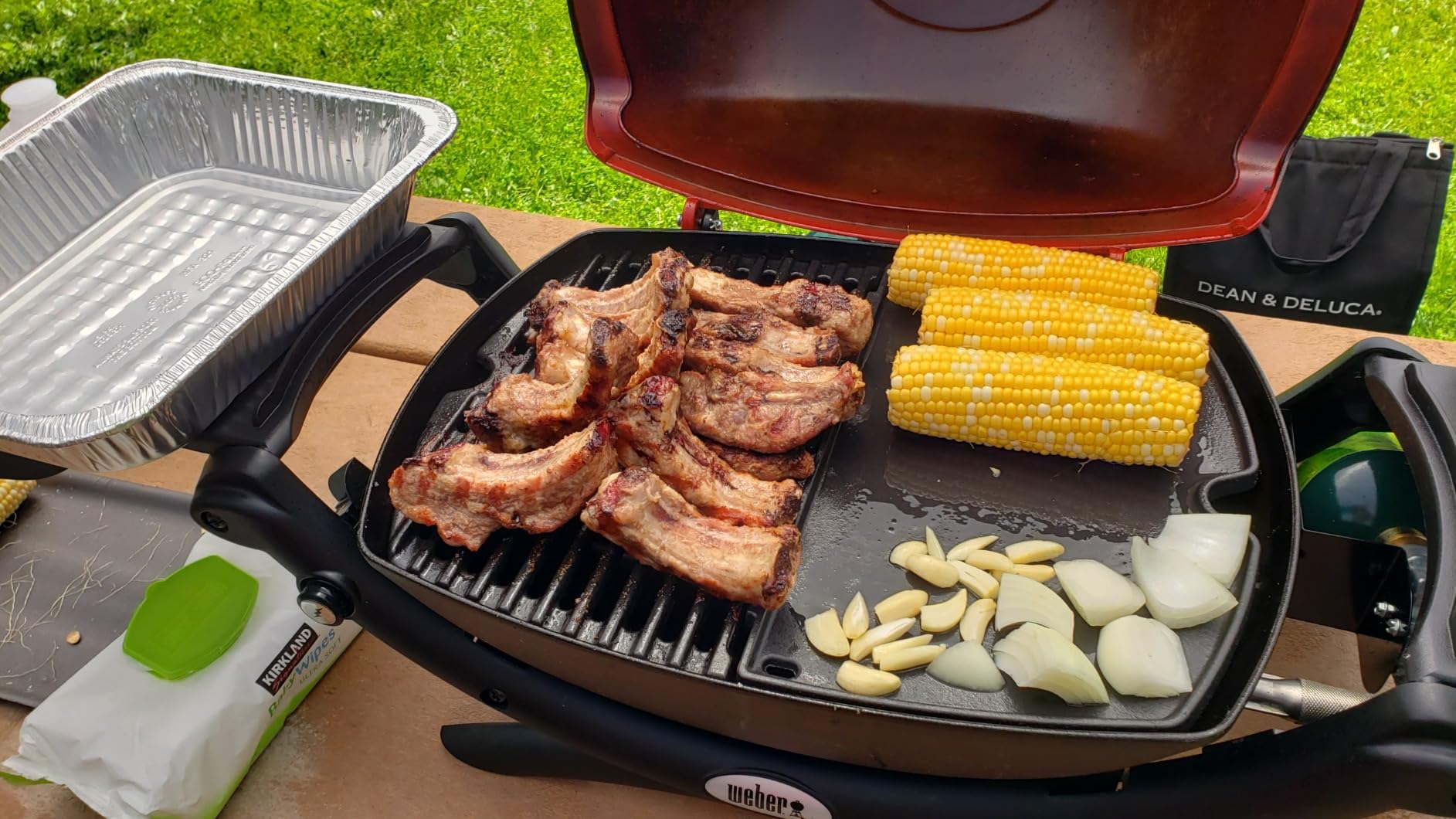 Weber Q1200 Liquid Propane Portable Gas Grill, Titanium - 1‑Burner Travel and Camping Grill with Cast‑Iron Grates & Electronic Ignition (8,500 BTU Burner) customer photo 2