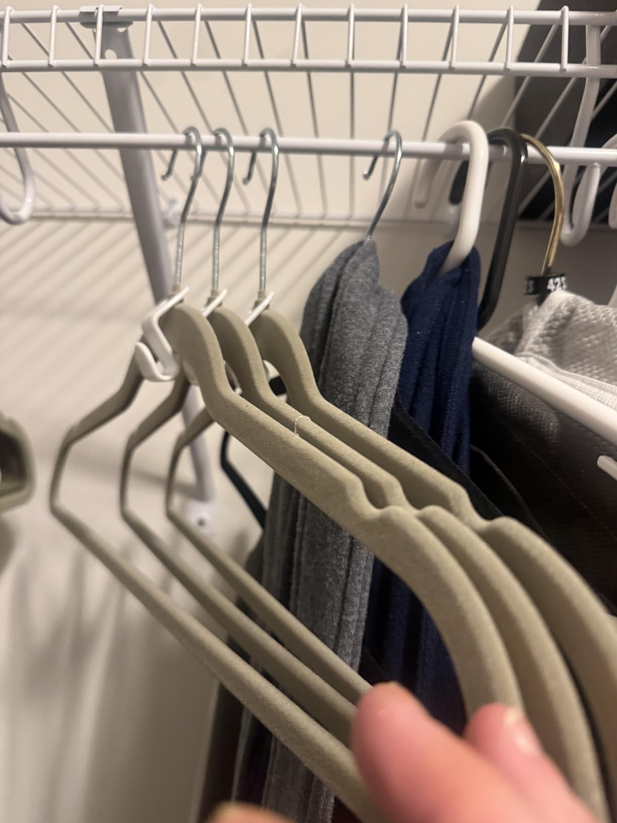 Amazon Basics Slim Velvet Non-Slip Space Saving Suit Clothes Hangers, Closet Organizer, Black, 50-Pack customer photo 2